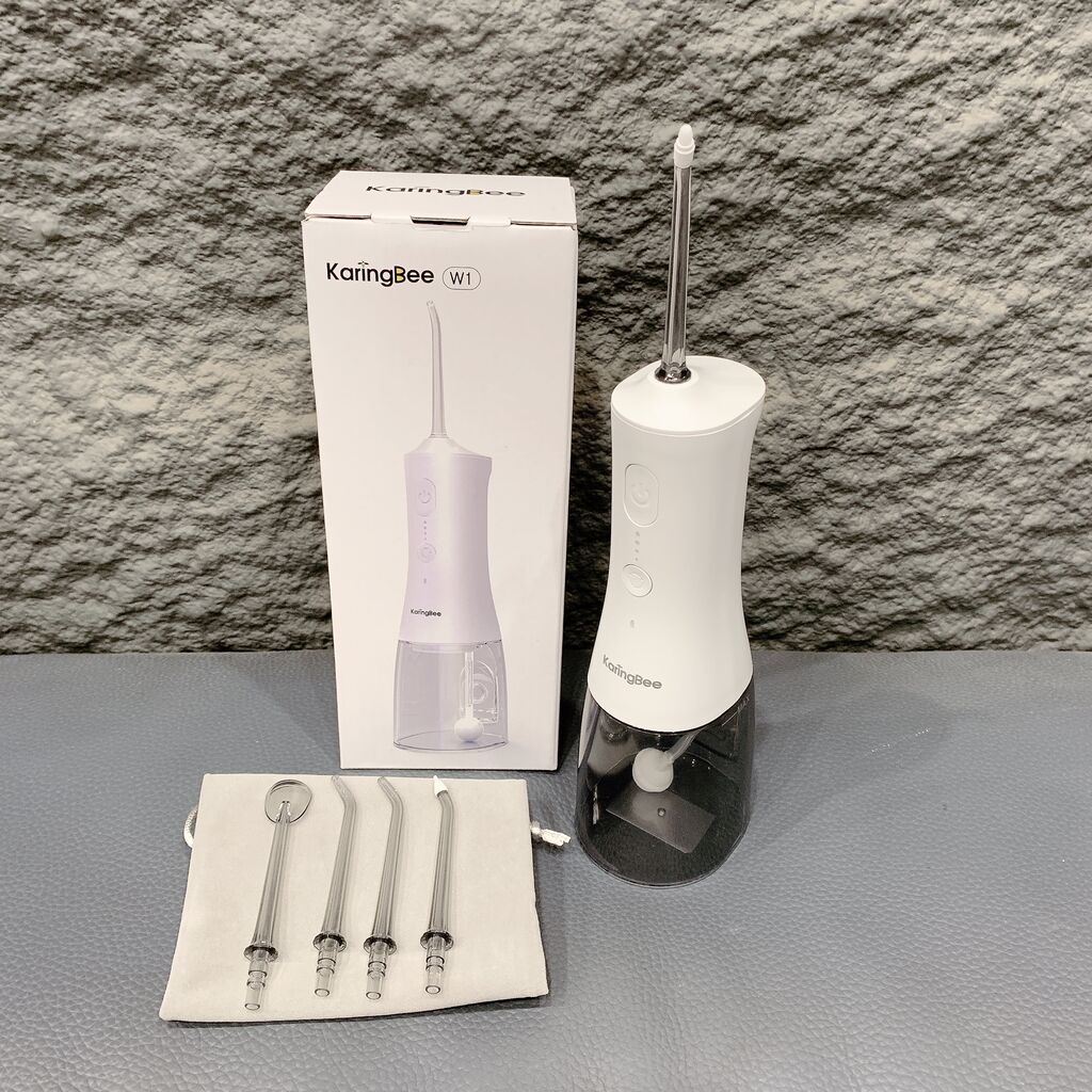Tăm nước WI hãng KaringBee ( Hàn Quốc ),  kháng nước IPX7, bình chứa lớn 300ml,.đầu phun xoay 360 độ