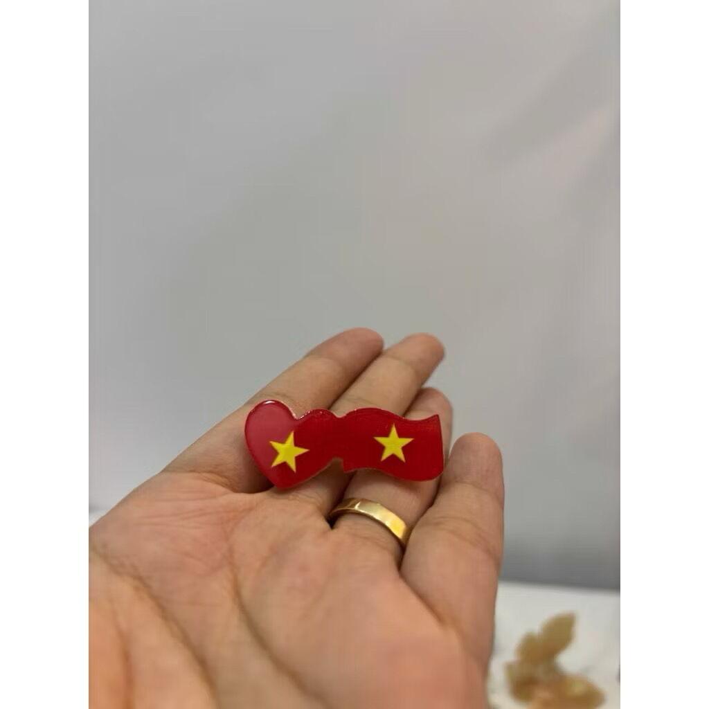 KẸP TÓC CỜ ĐỎ SAO VÀNG ĐÔI